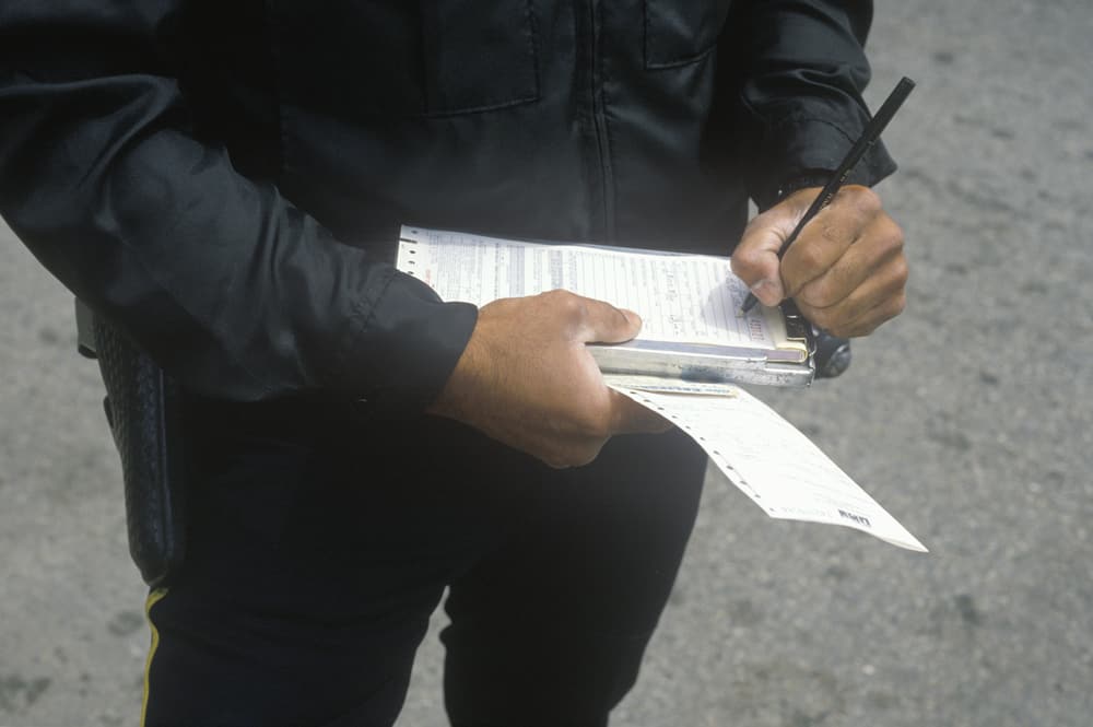 cop writing ticket