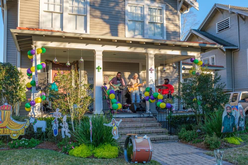 A band plays on the front porch of a home in New Orleans