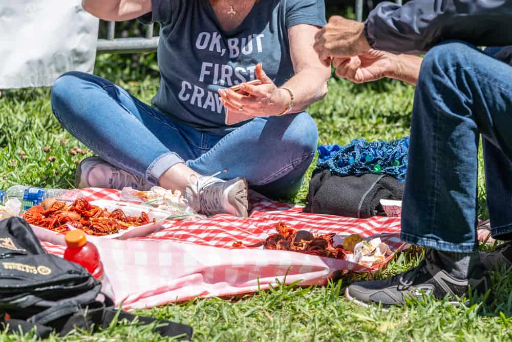 People on a picnic eating crawfish in Louisiana